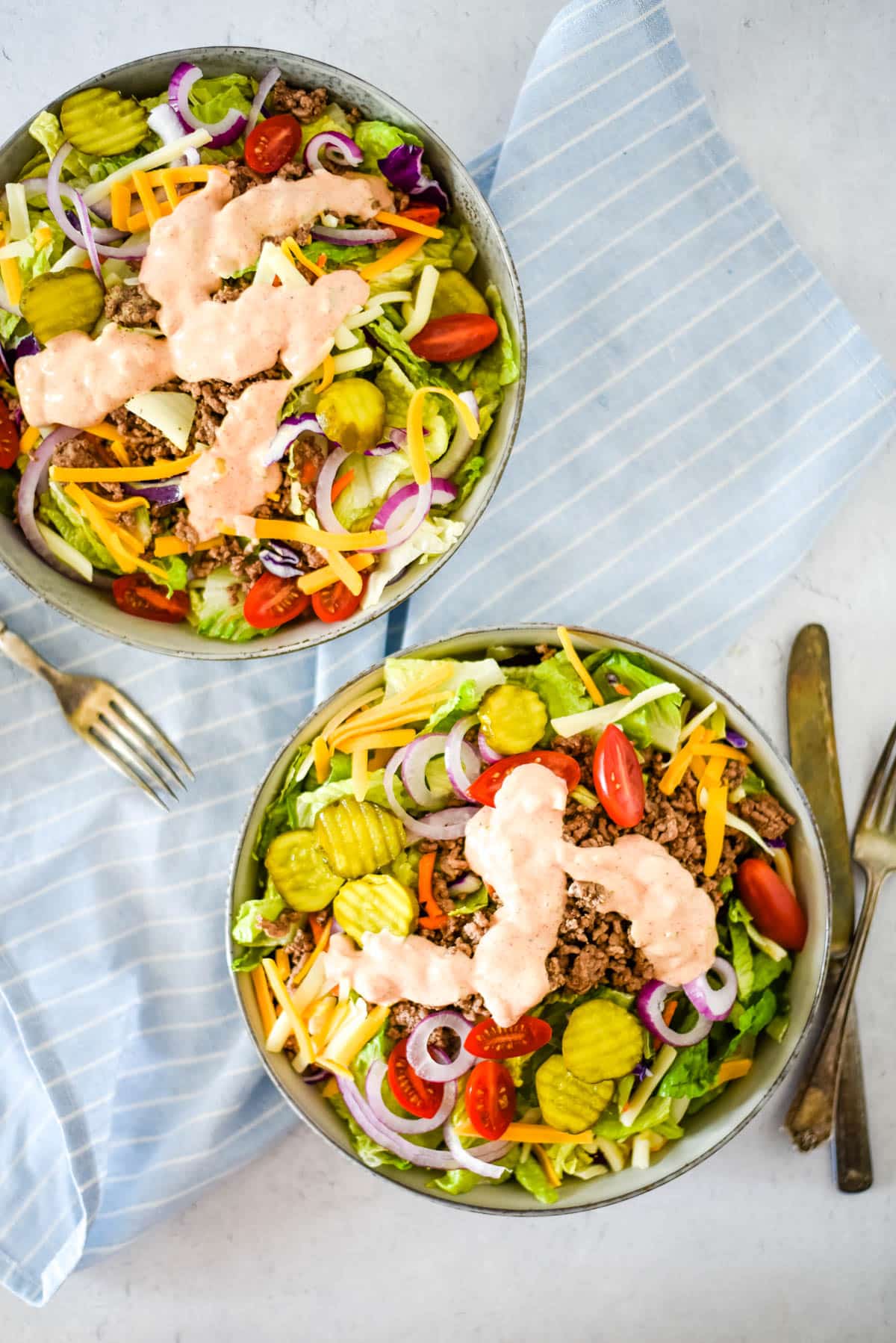 two bowls of cheeseburger salad