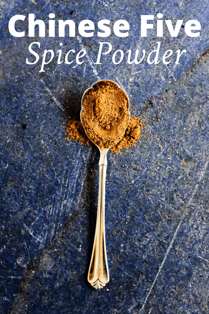 spoon with chinese five spice on it and text overlay that reads "chinese five spice powder"